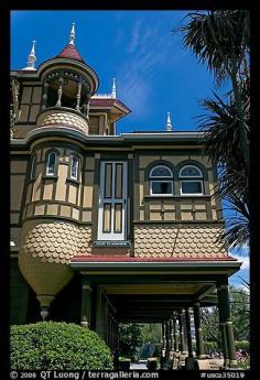 Door to nowhere, opening to a one-story drop. Winchester Mystery House, San Jose, California