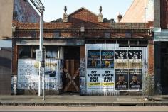 for lease - Johnston Street, Collingwood,  (2013) Johnston Street, Collingwood, Australia; a place in a constant state of flux. Here,  businesses open and close, residential properties emerge and diminish in a matter of months....the chaos, colours, and transience of this street in 2013. (text courtesy photographer Phillip Wilkinson)   (This is a working class suburb that is now highly gentrified)