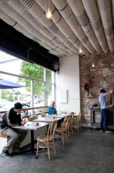 Coin Laundry Cafe Melbourne Australia, tea towels cover the ductwork.