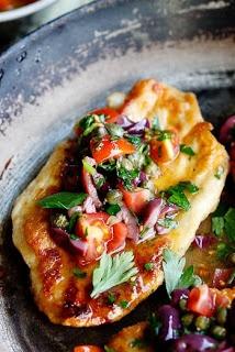 Chicken Escalopes with olive, caper & tomato dressing