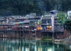 Fenghuang County (凤凰县), Hunan, China, is an exceptionally well-preserved ancient town.