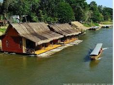 Kanchanaburi, Thailand Boutique River Raft Bungalows.  Literally on the River Kwai, great spot, reasonable price.  Kanchanaburi is fantastic for outdoor adventure.