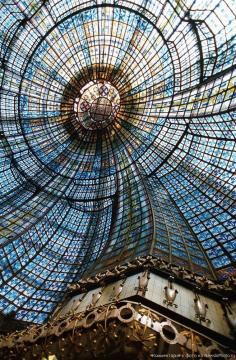 Paris, France... Interior view of the Magasins du Printemps department store...  Over 3000 pieces of stained glass!  Gorgeous!!!