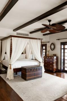 The dark wood complements the beautiful white accents in the gorgeous Ritz Carlton hotel room in Puerto Rico.