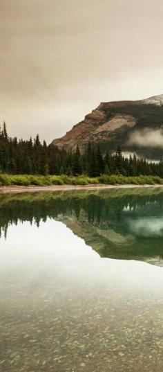 Calm Elizabeth Lake, Glacier National Park, Montana, United States.