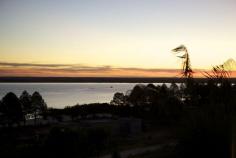 Breathtaking sunset over the water in Carmelo, Uruguay.