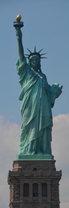 The Statue of Liberty in Upper New York Bay on Liberty Island, New York • designer: Frédéric Bartholdi • photo: Teagan Kahla on Living Life Today