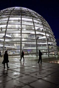 The Reichstag - Berlin, Germany. This is like one of the coolest things I've ever been in!!! A spiral staircase winds all te way to the top inside.