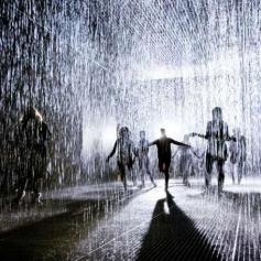 Rain Room in London. Rain falls in every spot except for the spot you are standing in.