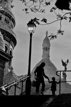 Montmartre silhouette: mother and child in front of Sacre Coeur