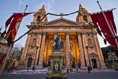 Saint Publius Church is illuminated with thousands of white lights during their annual feast day in Floriana, Malta