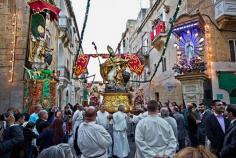 Icon of St. Publius is carried through the streets of Floriana, Malta for hours during the community's patron saint celebration