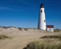 Colonial homes share space with upscale boutiques and restaurants on the cobblestoned streets of Nantucket Town.