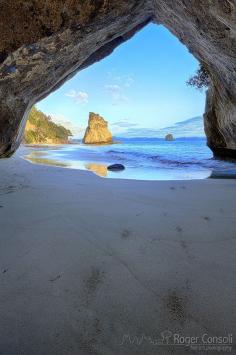 Sunrise in Cathedral Cove Rock in the Coromandel Peninsula - New Zealand