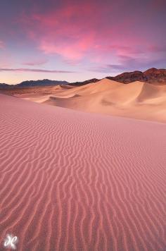 The Dumont Dunes north of Baker, California are beautiful: long, sloping, graceful lines and curves, almost no vegetation, and made of gorgeously reflective silica sand.