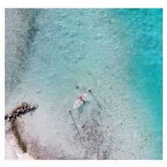 Relaxation takes on a whole new meaning at the St. Regis Bora Bora. Photo courtesy of misscindrich on Instagram.