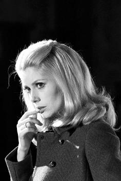 Catherine Deneuve on the set of Belle de Jour, 1967. Suit: Yves Saint Laurent.