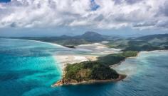 Hill Inlet, Queensland, Australia - My friends and I all made a last minute decision to do a 20-minute helicopter trip that left from Hamilton Island and did a loop over Whitsunday Island on our last day in the Whitsundays.  It was the perfect way to cap off our trip. We had stunning views across the Islands and to the mainland for the entire flight, but this was definitely the best of them all: Whitehaven Beach and Hill Inlet. What an amazing spot.   The helicopter ride was one of the better values for money I've seen as well -- $200pp/20 minutes. They're offered daily from Hamilton Island Air.