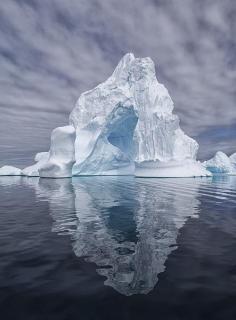 Iceberg refleciton in the Antarctica..... This place looks so miserable and beautiful at the same time.