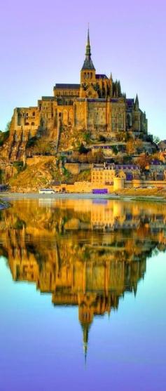 Mont-Saint Michel at dusk in Normandy, France