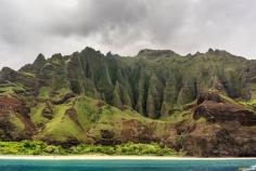 Thanks to the rugged grandeur of the deep, narrow valleys that litter the Na Pali Coast the region remains largely off limits to visitors. No roads wend their way to scenic lookouts, no hotels offer onsite stays and there’s certainly no mobile phone signal. It’s the perfect excuse to disconnect for someone like me who has internet capability fed to them intravenously whenever possible. Read more about... Discovered by Charli & Ben @Charli & Ben @WanderlustersUK at Na Pali Coast State Park, Kauai, Hawaii