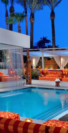 The Pond is an always-buzzing alfresco bar shaded by towering palm trees in Vegas.