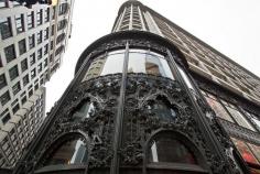 
                        
                            Bronze-plated cast-iron ornamental work of the Sullivan Center in Chicago, formerly the downtown Carson, Pirie, Scott and Company Building on State Street
                        
                    