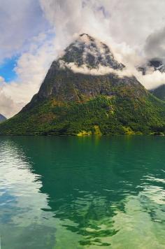 
                        
                            Cloudy Peak, Oppstryn, Norway
                        
                    