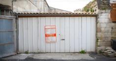 From The Outside, This Looks Like An Ordinary Garage Door, But You'll Never Guess What's Inside.