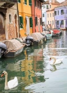 Burano, Venice, Italy - Burano is a stunning and colorful island in the Venice Archipelago. The vibrant colors, canals and architecture is surreal and at the same time so amazing to experience.