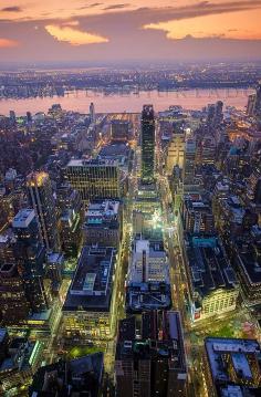 Beautiful View of Midtown Manhattan and Hudson River at Dusk, New York, United States.