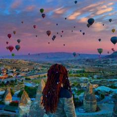 Hot air balloons take an early morning ride over Cappadocia, Turkey. Photo courtesy of dametraveler on Instagram.