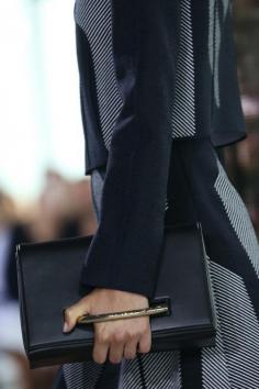 
                        
                            Black Statement Bag
                        
                    