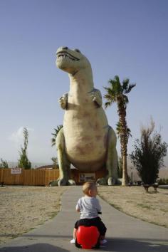 Travel Tip: Take a cute little toy car to iconic roadside attractions for awesome pictures of your kid. :)