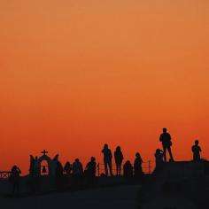 Sunset silhouette in Santorini. Photo courtesy of lamourdeparis on Instagram.