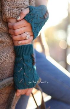 
                    
                        Teal Button Mittens
                    
                