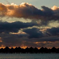 
                    
                        A dramatic sunset transforms the sky above the overwater bungalows at the St. Regis Bora Bora. Photo courtesy of rolabagnara on Instagram.
                    
                