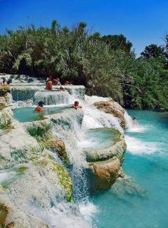 
                    
                        Mineral Baths, Saturnia Tuscany Italy  Terme di Saturnia are a group of lush geothermal springs located in the municipality of Manciano, just a few kilometres from the village of Saturnia, Italy.    The thermal waters of Saturnia have a series of cascades at 37°, where nature forms dozens of beautiful pools at different levels.
                    
                