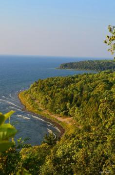 
                    
                        Peninsula S.P., Door County, Wisconsin, USA  Peninsula State Park is a 3,776-acre (1,528 ha) Wisconsin state park with eight miles (13 km) of Green Bay shoreline in Door County. Peninsula is the third largest state park in Wisconsin, and is visited by an estimated 1 million visitors annually.
                    
                