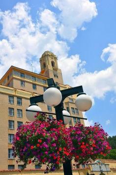 
                    
                        Arlington Hotel, Hot Springs, Arkansas. The perceived healing properties of the hot spring water were discovered centuries ago, and the waters were legendary among several Native American tribes. Following federal protection in 1832, the city developed into a successful spa town.
                    
                