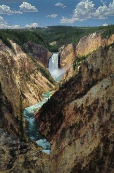 
                    
                        Standing at Artist's Point for a very scenic view of Yellowstone Falls. This spot offers one of the most breath-taking experiences in the entire Park. Seeing the colour of the soil, one can understand why this is called Yellowstone Discovered by Shawn Boyle at Yellowstone Falls, Park County, Wyoming
                    
                