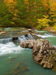 
                    
                        Six Fingers Falls in Ozark National Forest, northern Arkansas. The Ozark – St. Francis National Forest is composed of two separate forests, Ozark National Forest and St. Francis National Forest, each with their own biological, topographical, and geological differences. Together, the two forests are home to 23 developed campgrounds, and include nine swimming areas, 395 miles of hiking trails, and 370 miles of streams for fishing.
                    
                