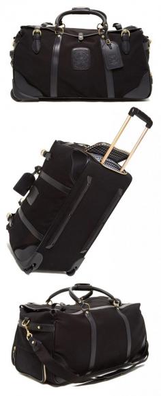 
                    
                        Cute Rolling Luggage / Duffel Bag by Ghurka Kilburn
                    
                