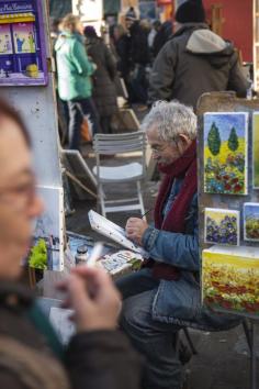 
                    
                        ARTIST IN MONTMARTRE
                    
                