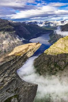 
                    
                        Trolltunga, Norway by Nicoletta Muscas
                    
                