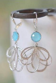 
                    
                        Sky Blue Dangle Earrings in Silver
                    
                