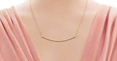 
                    
                        It was my nine-year-old daughter who first noticed that this simple, elegant necklace from the Tiffany T collection resembled a smile.    And that, it turns out, is precisely what it is called. I’. . .
                    
                