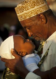 
                    
                        Father and baby in Lamu, Kenya
                    
                