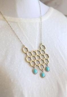 
                    
                        Honeycomb Statement Necklace in Antique Bronze with Turquoise Drops
                    
                