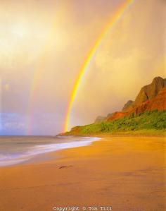 
                    
                        Rainbow at Kalalau Beach  Na Pali Coast State Park  Island of Kauai, Hawaii  End of Kalalau Trail  Na Pali Cliffs  September
                    
                